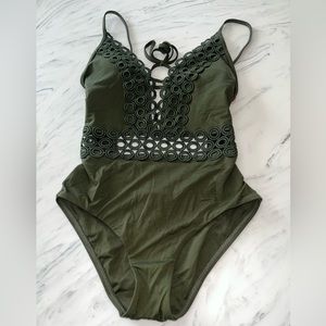 Becca one piece cutout rings tie open back olive green bathing suit swim M